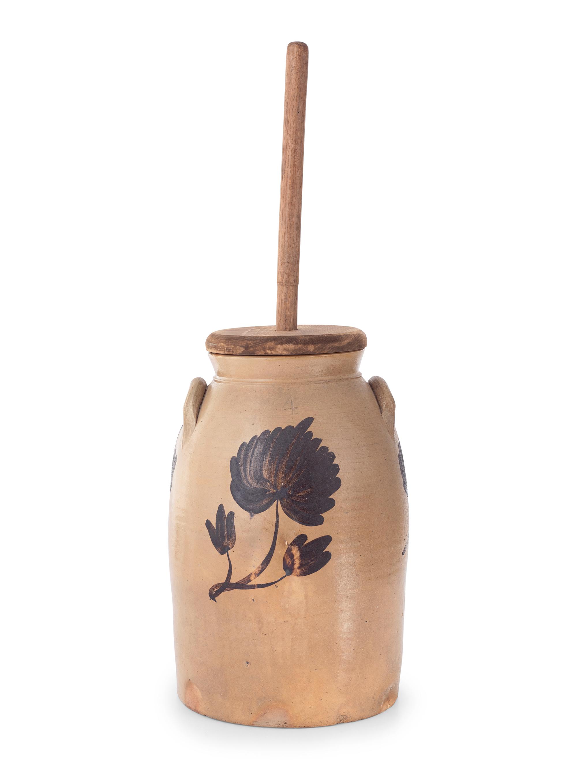 A Four Gallon Stoneware Butter Churn