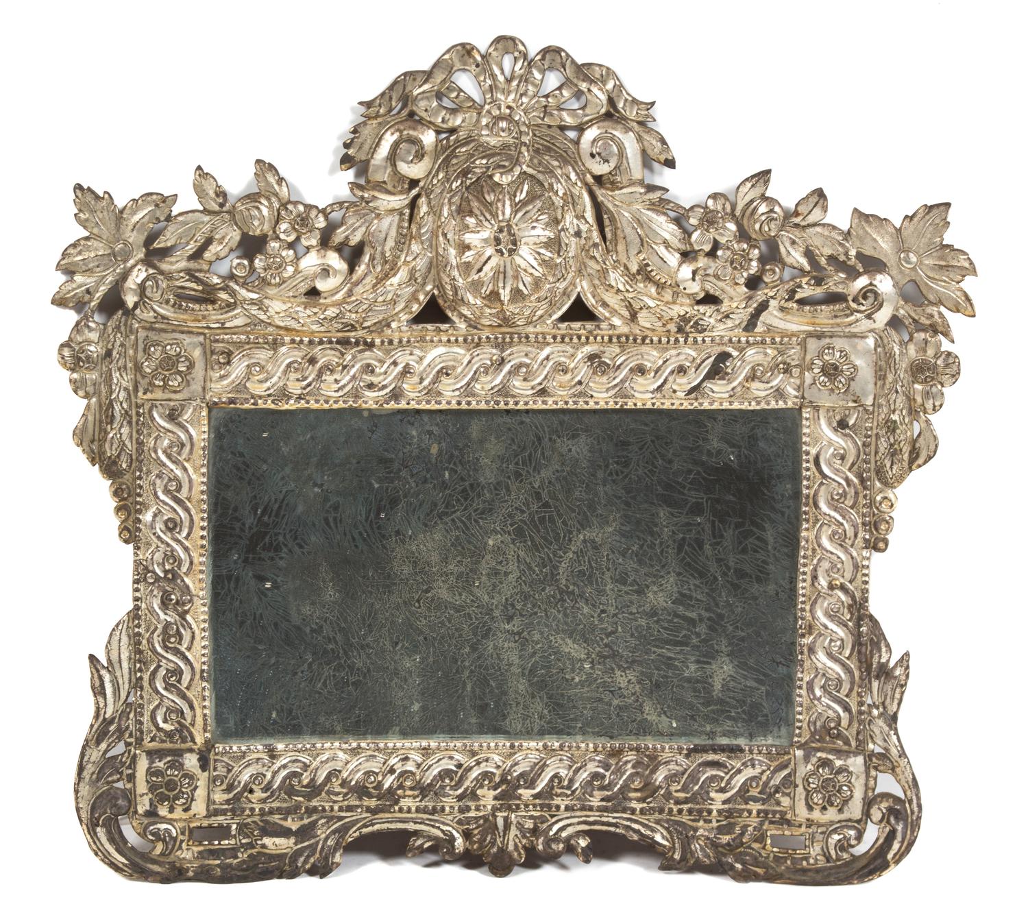 A Continental Stamped Silvered Metal Mirror Height 15 1/2 x width 15 1/2 inches. — 19TH CENTURY