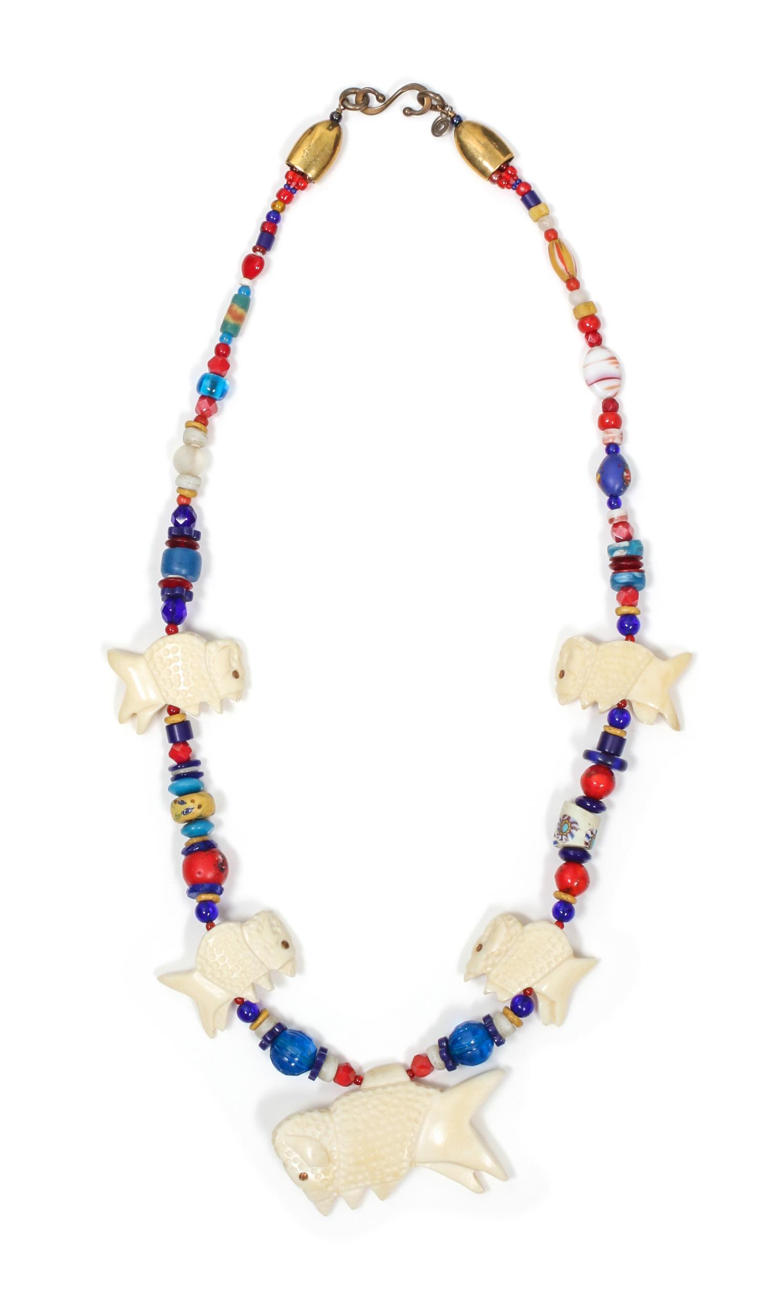 A Buffalo Fetish Necklace, Robert Kaniatobe (1936-1998) Length of the first 26 inches.