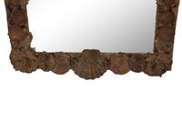 A Grotto Style Carved Giltwood Mirror