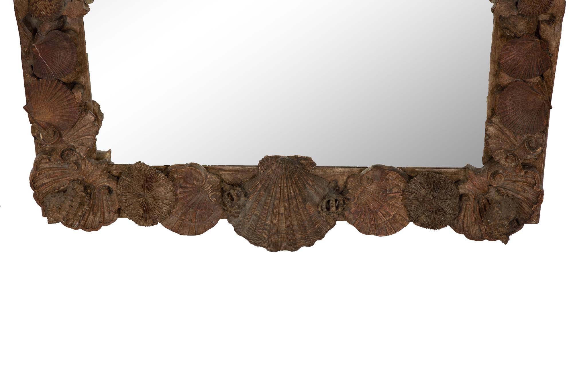 A Grotto Style Carved Giltwood Mirror
