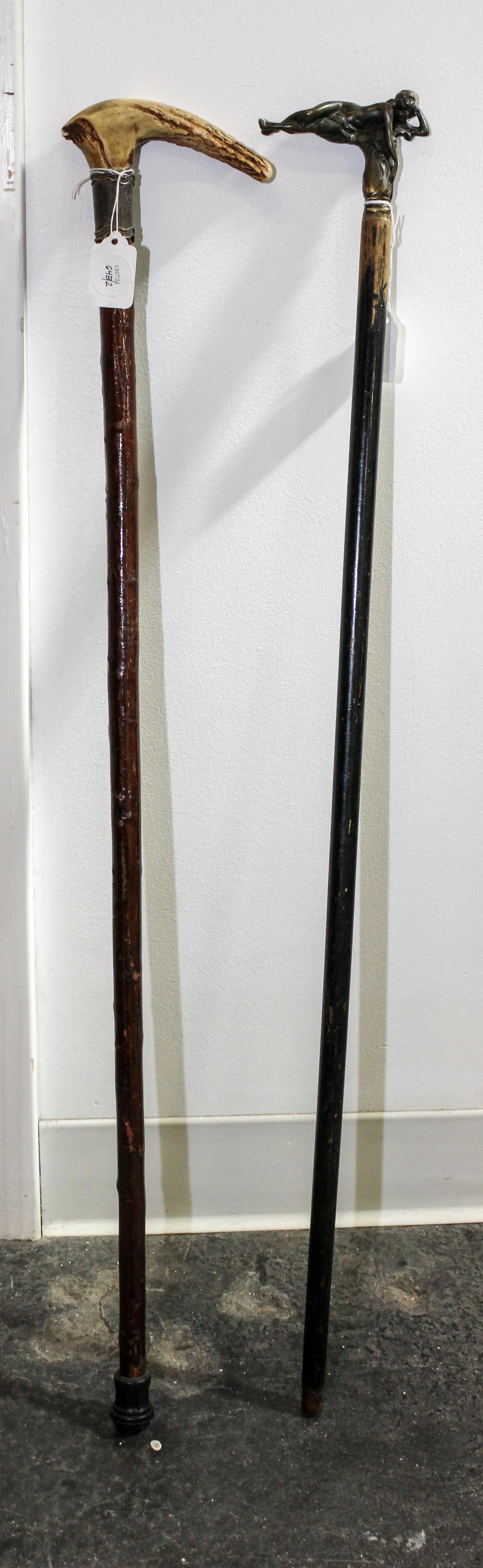 A Group of Two Canes Length of longest 33 1/2 inches.