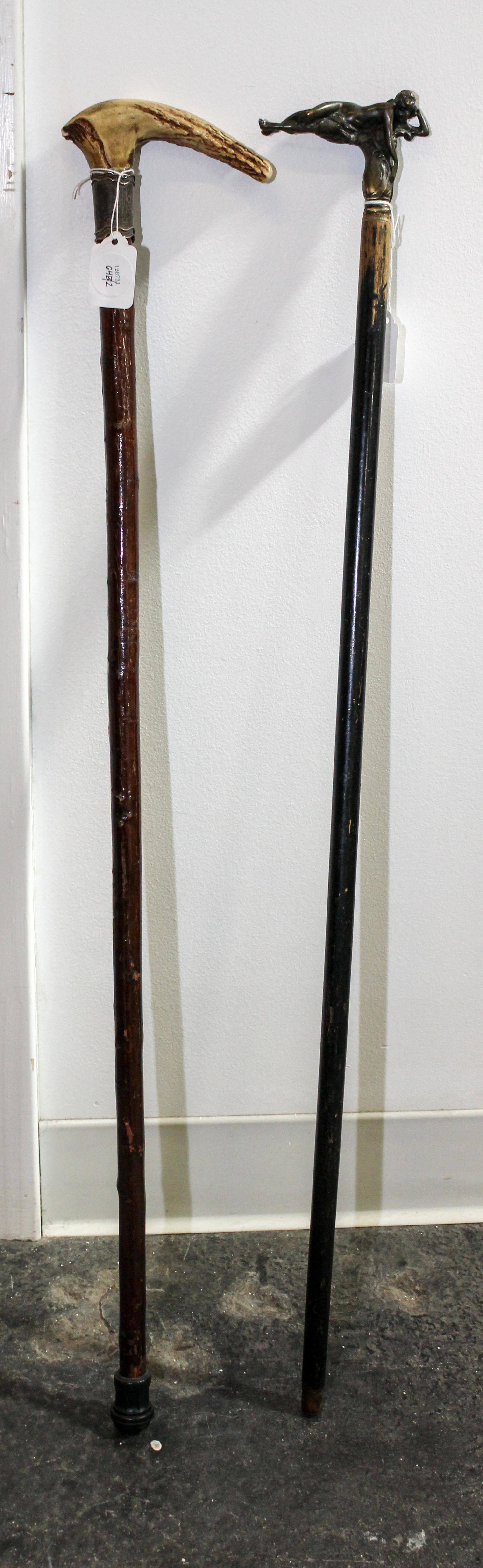 A Group of Two Canes Length of longest 33 1/2 inches.