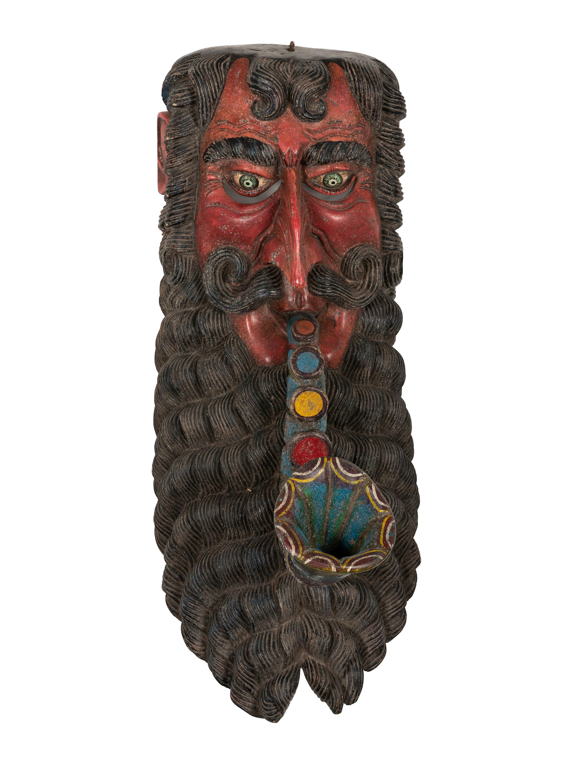 A Mexican Carved and Painted Wood Festival Mask
