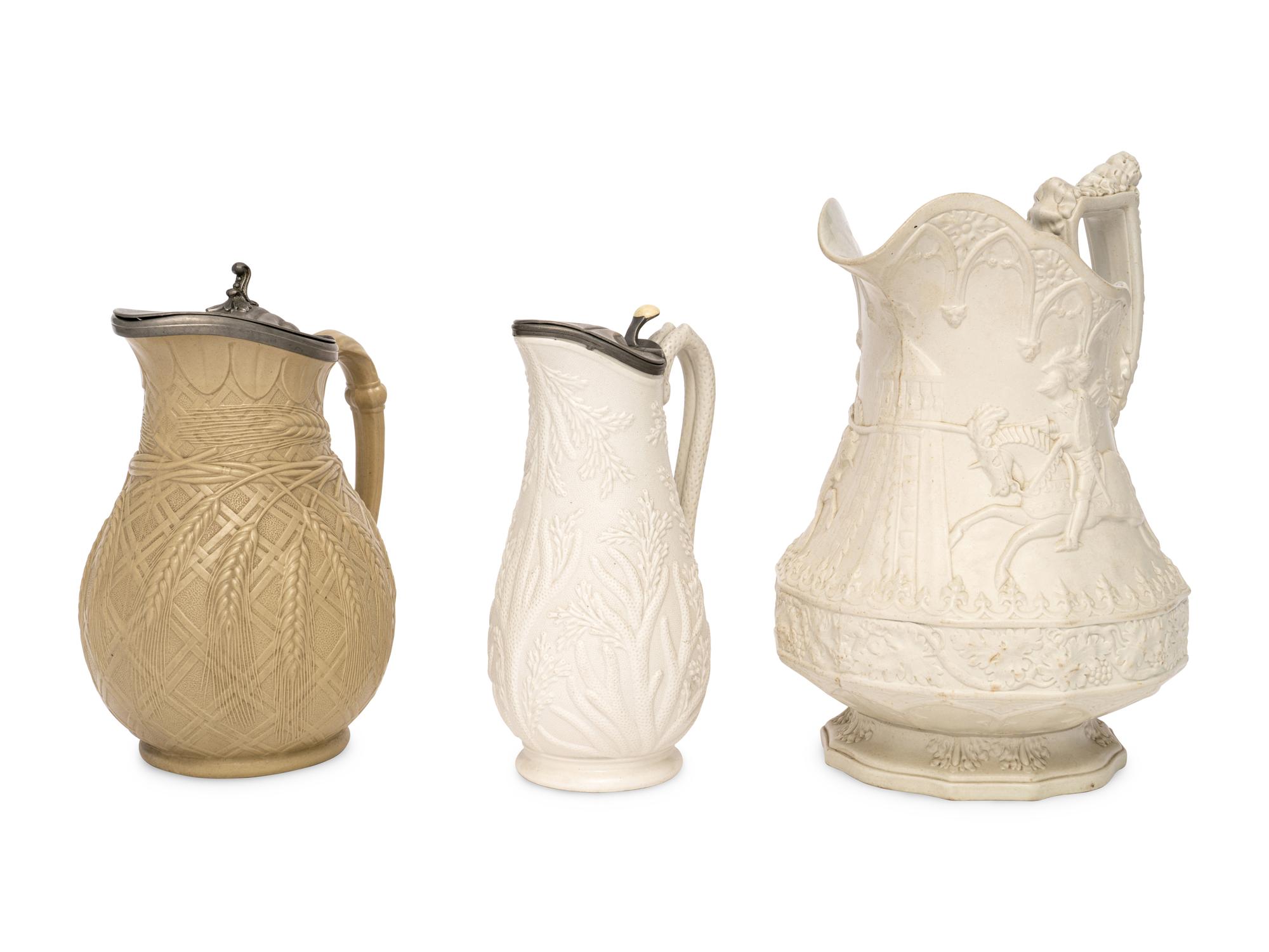 Three English Salt-Glazed Earthenware Pitchers
