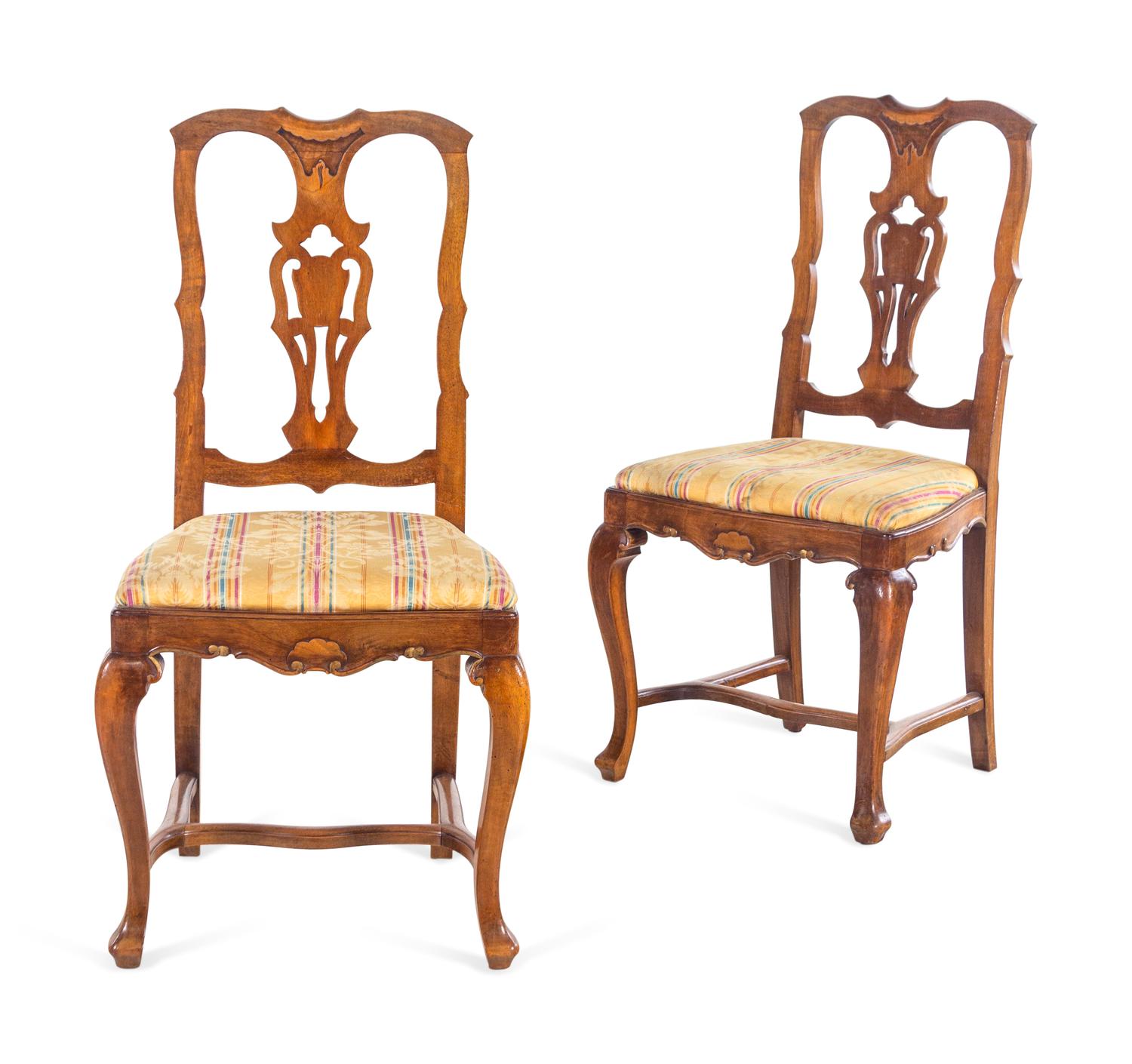 A Set of Eight French Walnut Dining Chairs