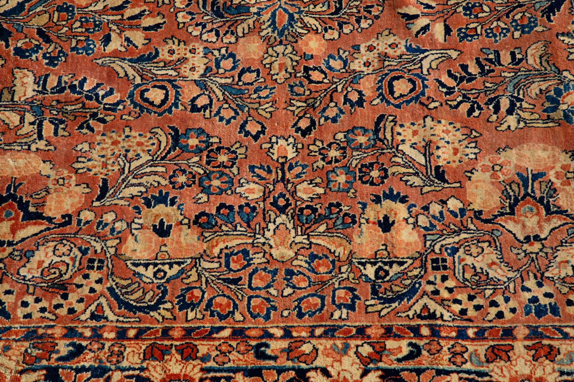 A Sarouk Wool Rug — 20TH CENTURY