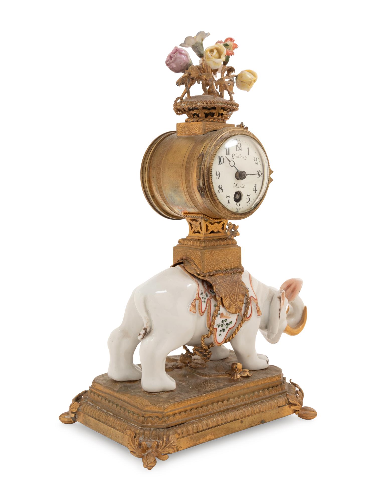 A French Porcelain and Gilt Bronze Mantel Clock