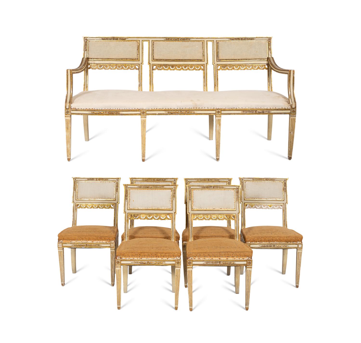 An Italian Louis XVI Style Cream Painted and Parcel Gilt Parlor Suite