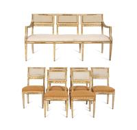 An Italian Louis XVI Style Cream Painted and Parcel Gilt Parlor Suite