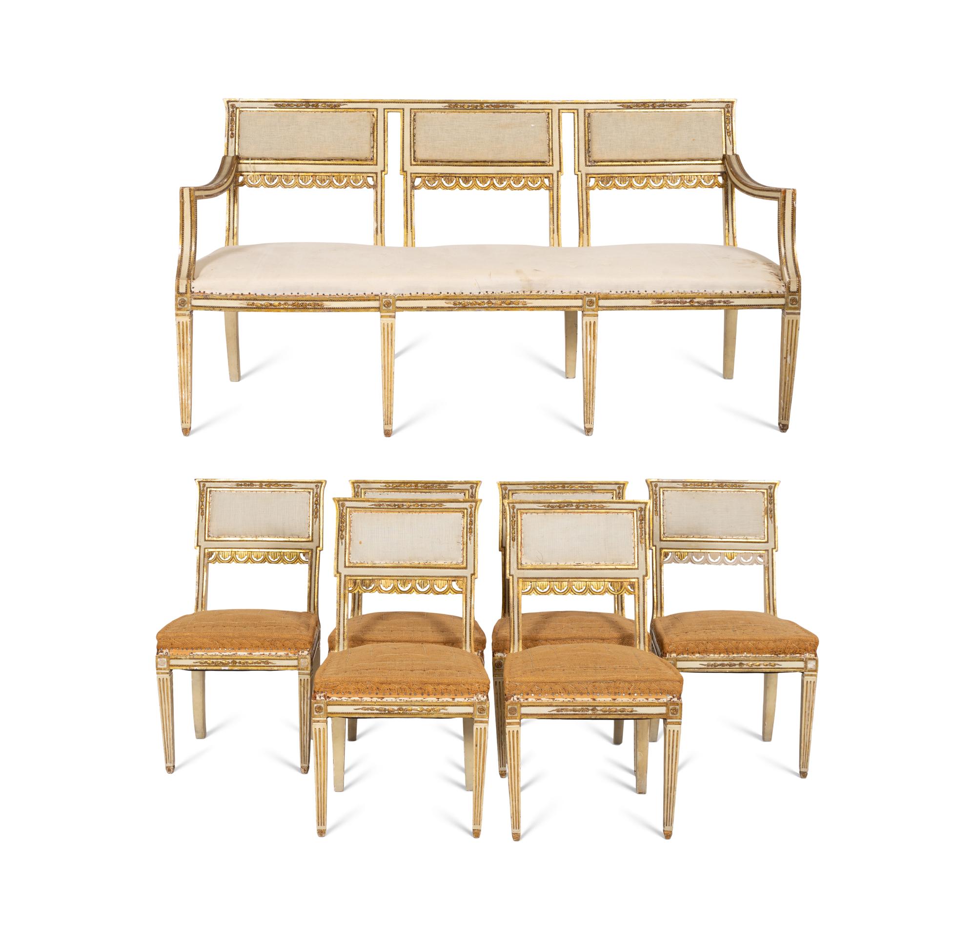 An Italian Louis XVI Style Cream Painted and Parcel Gilt Parlor Suite