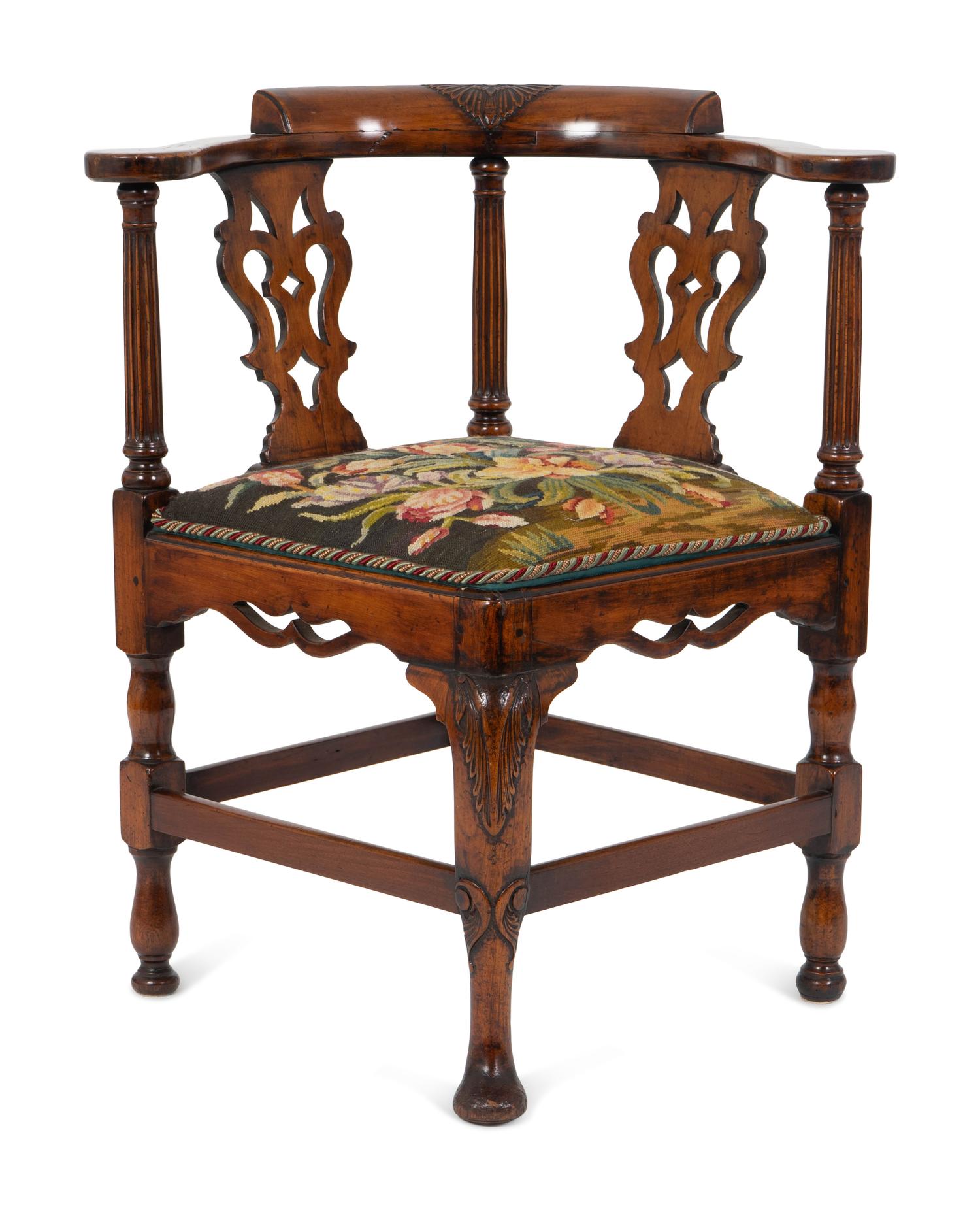 A William IV Carved Walnut Corner Chair — 19TH CENTURY