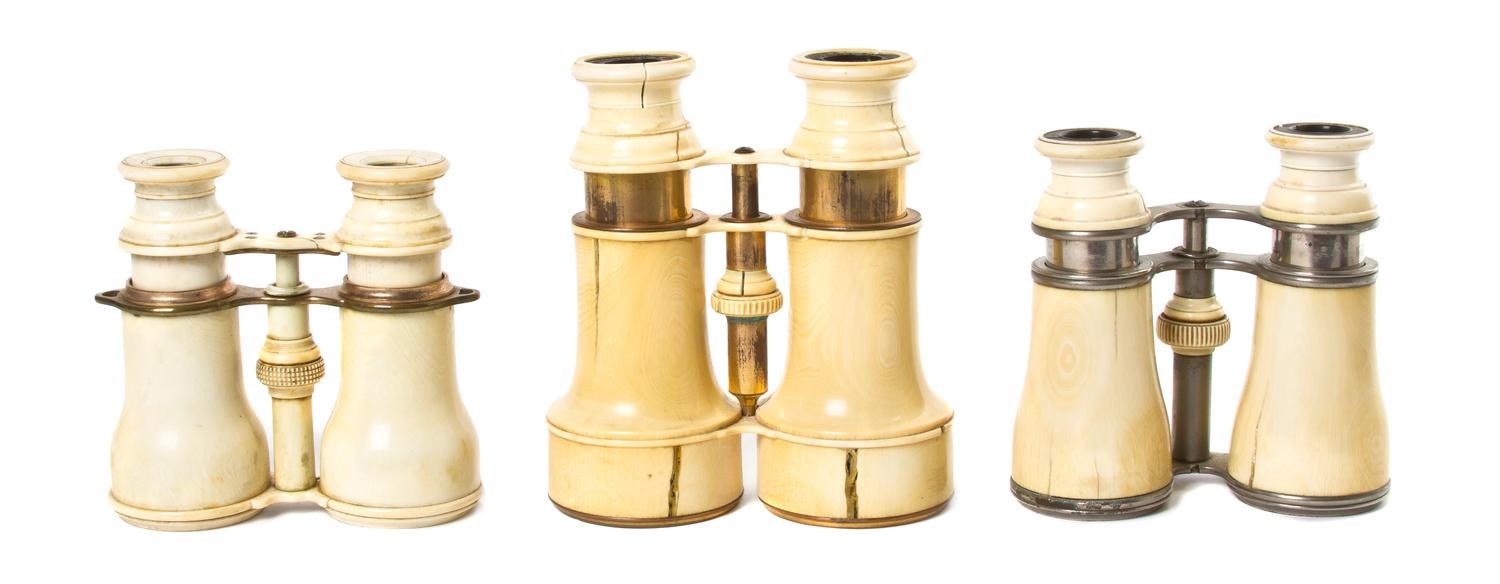 Three Pairs of French Ivory Veneered Opera Glasses, Width of widest 5 inches.