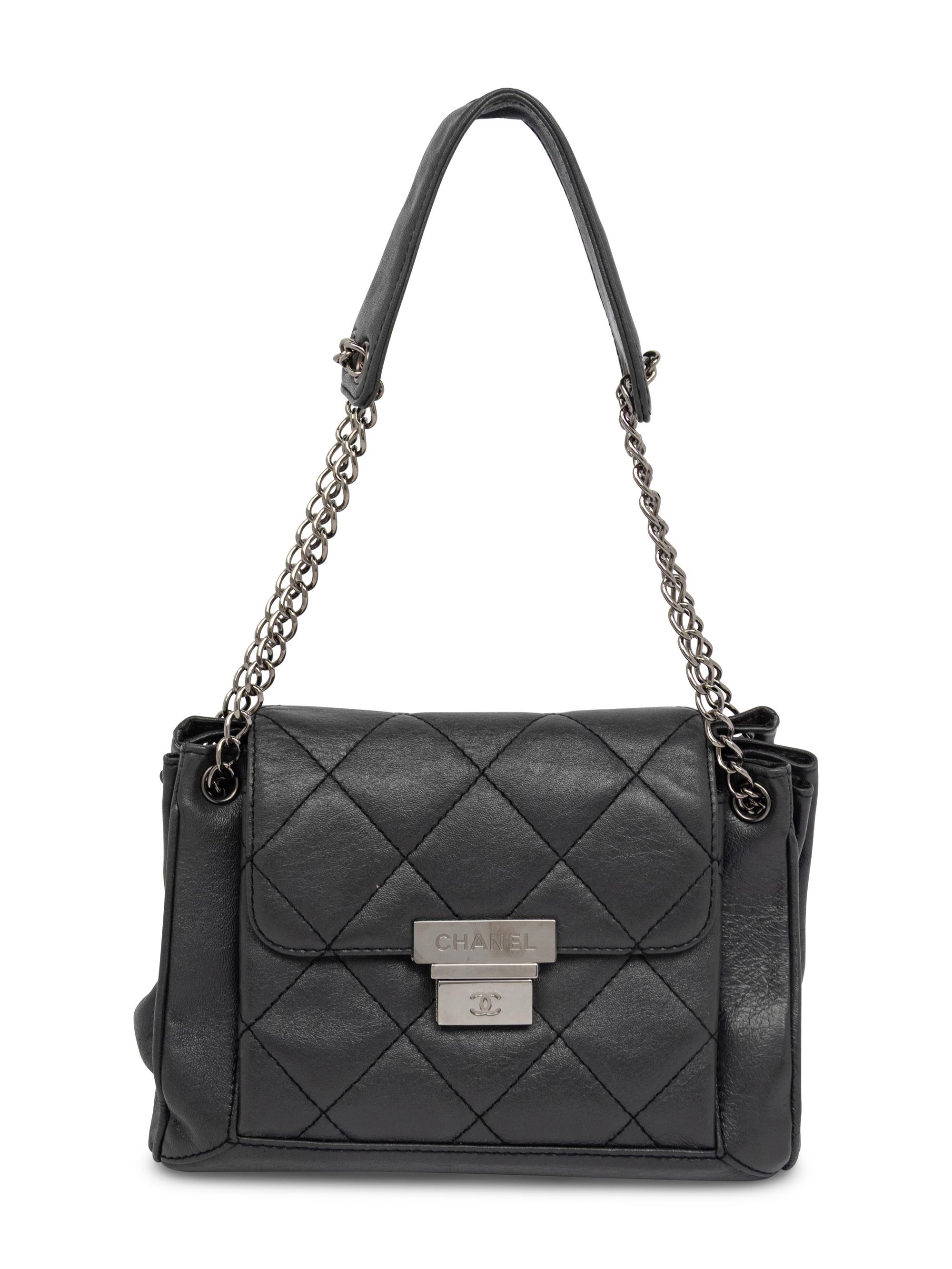 CHANEL, ACCORDION PUSH-LOCK FLAP BAG