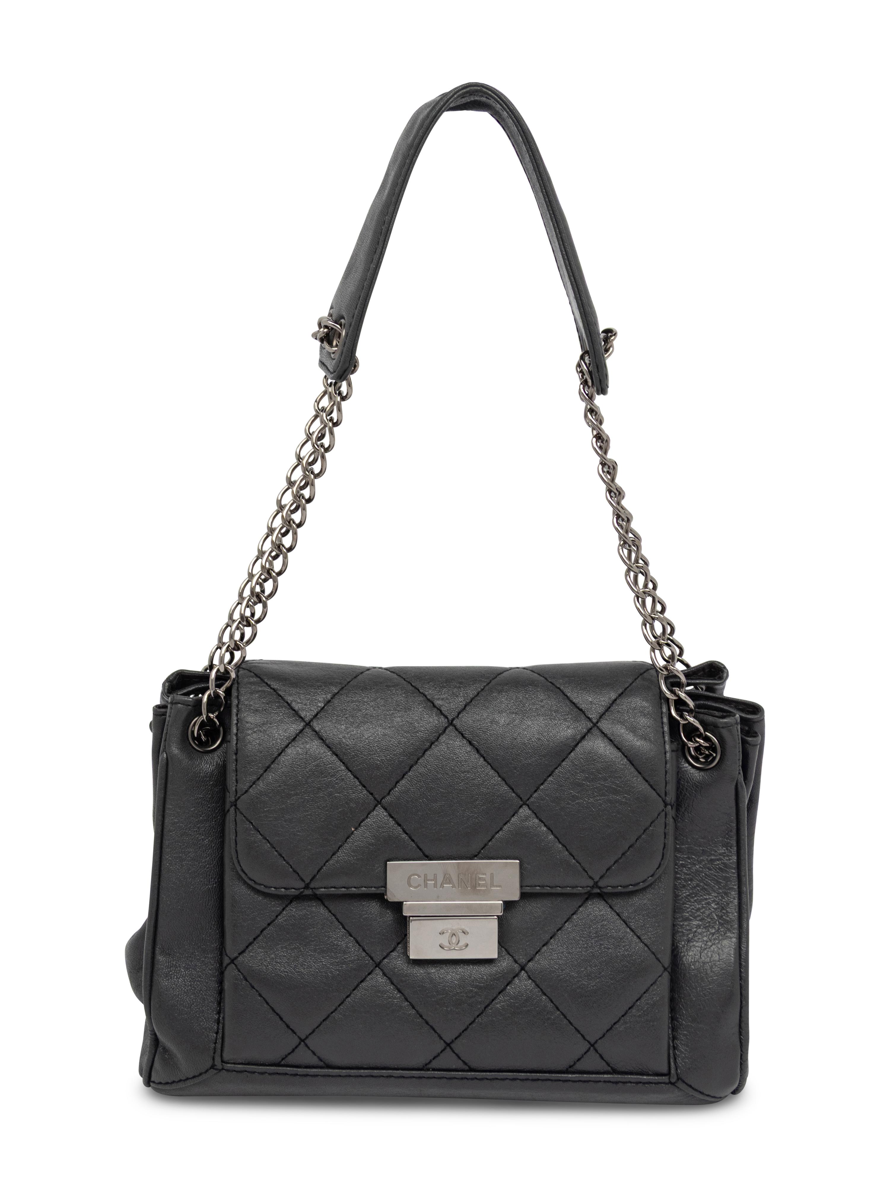 CHANEL, ACCORDION PUSH-LOCK FLAP BAG