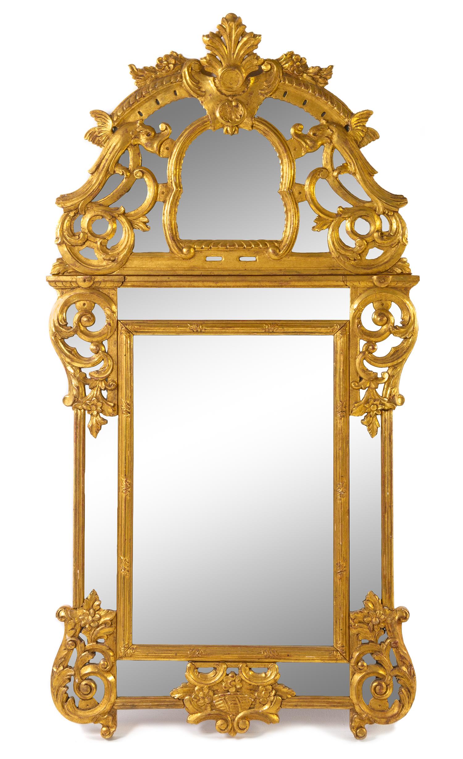 A Regence Style Giltwood Mirror Height 62 inches. — 20TH CENTURY