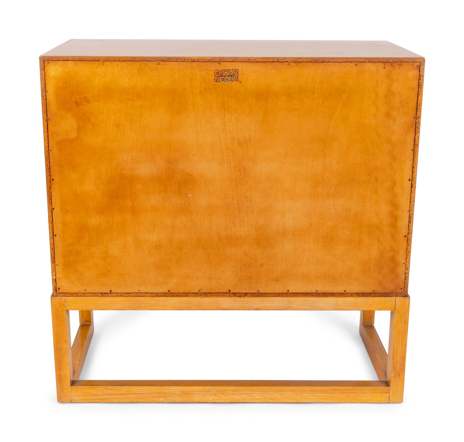 A Hollywood Regency Style Painted Cabinet — 20TH CENTURY