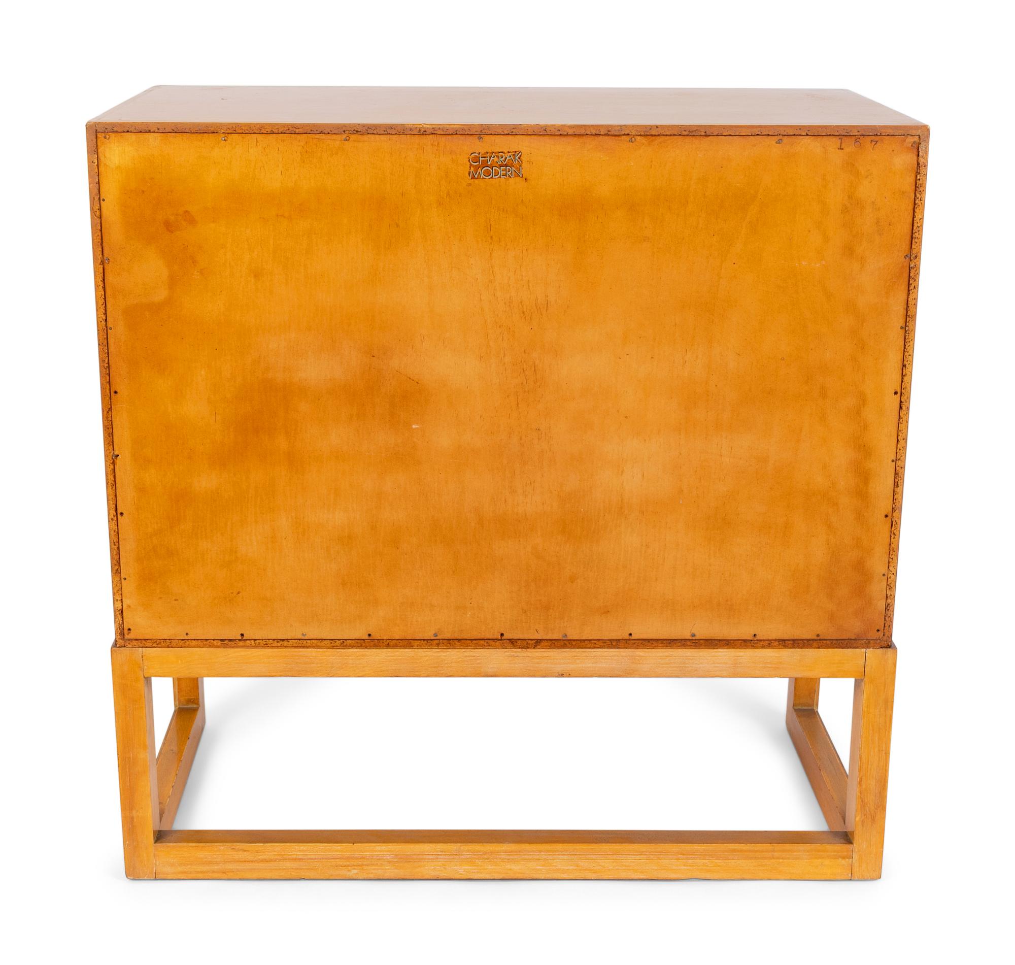A Hollywood Regency Style Painted Cabinet — 20TH CENTURY