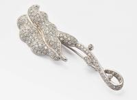 A Platinum and Diamond Flower Brooch