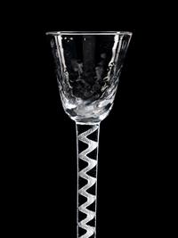 Two Moulded Glass Wine Glasses