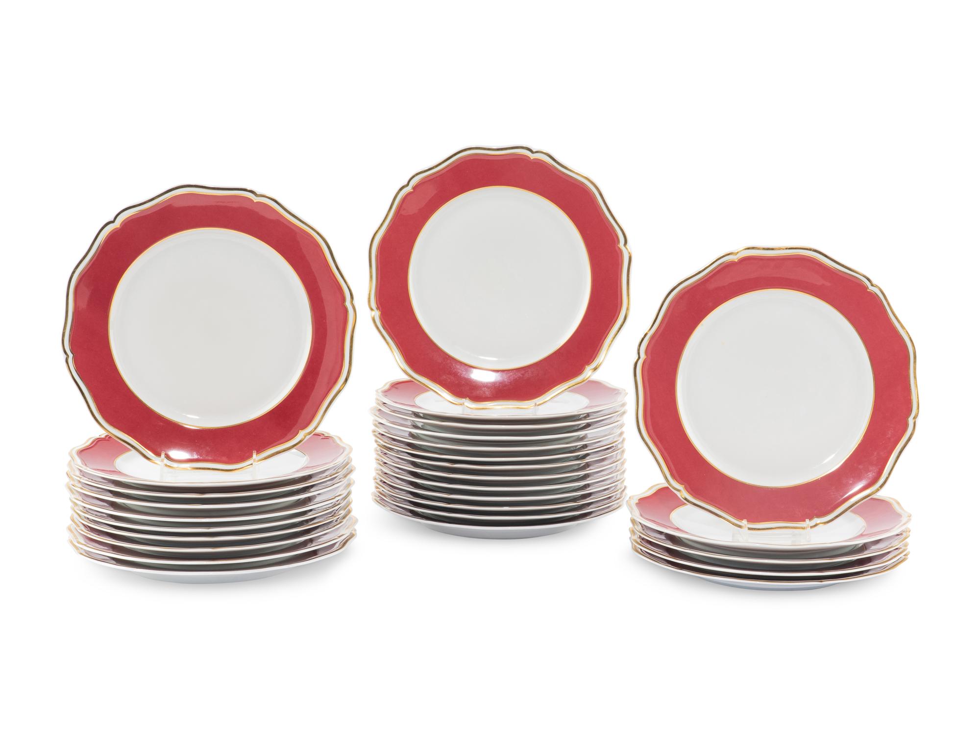 A Set of Twenty Eight A. Raynaud & Co. Limoges Polka Dinner Plates