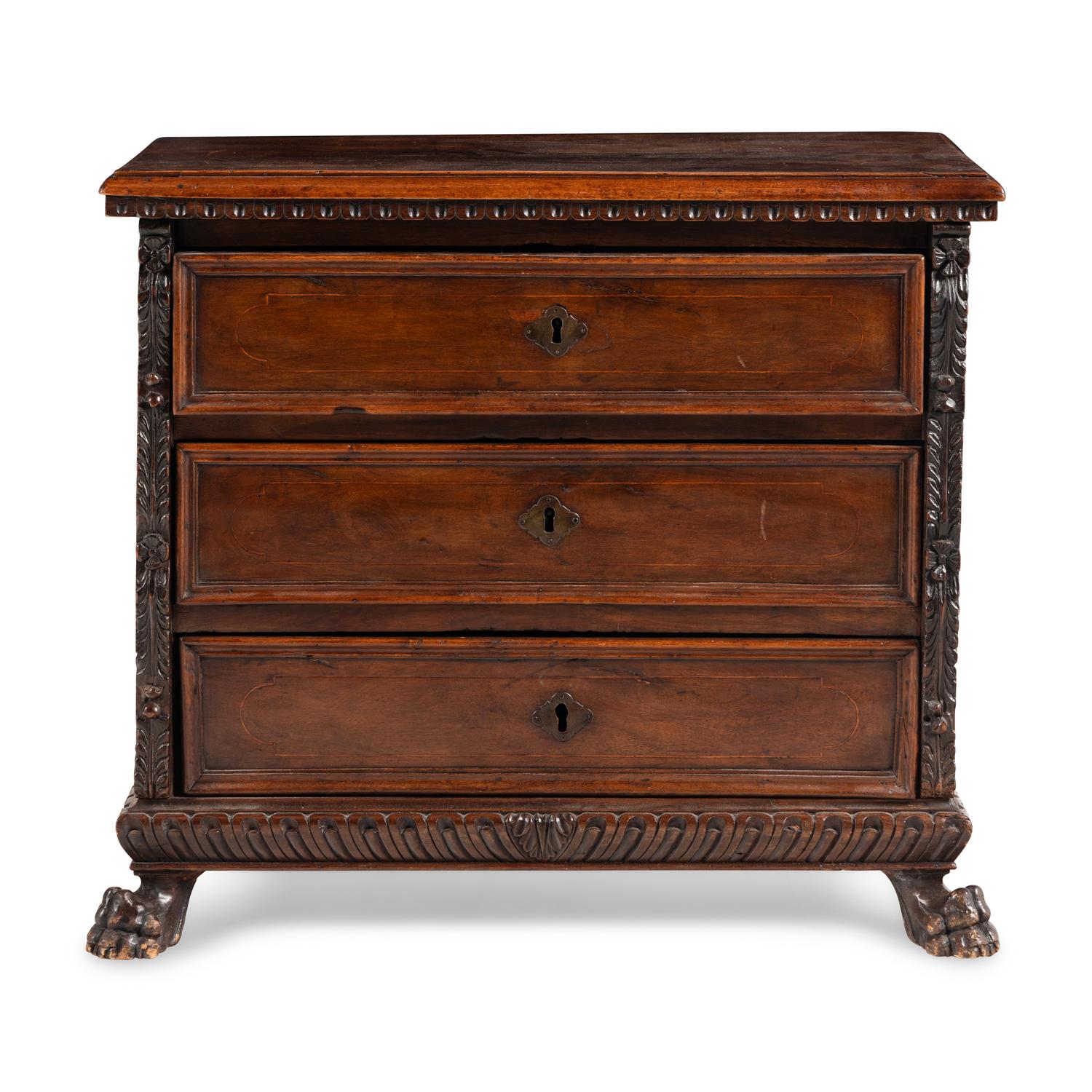 An Italian Baroque Walnut Chest of Drawers