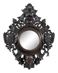 A Black Forest Carved Oak Game Trophy Mirror