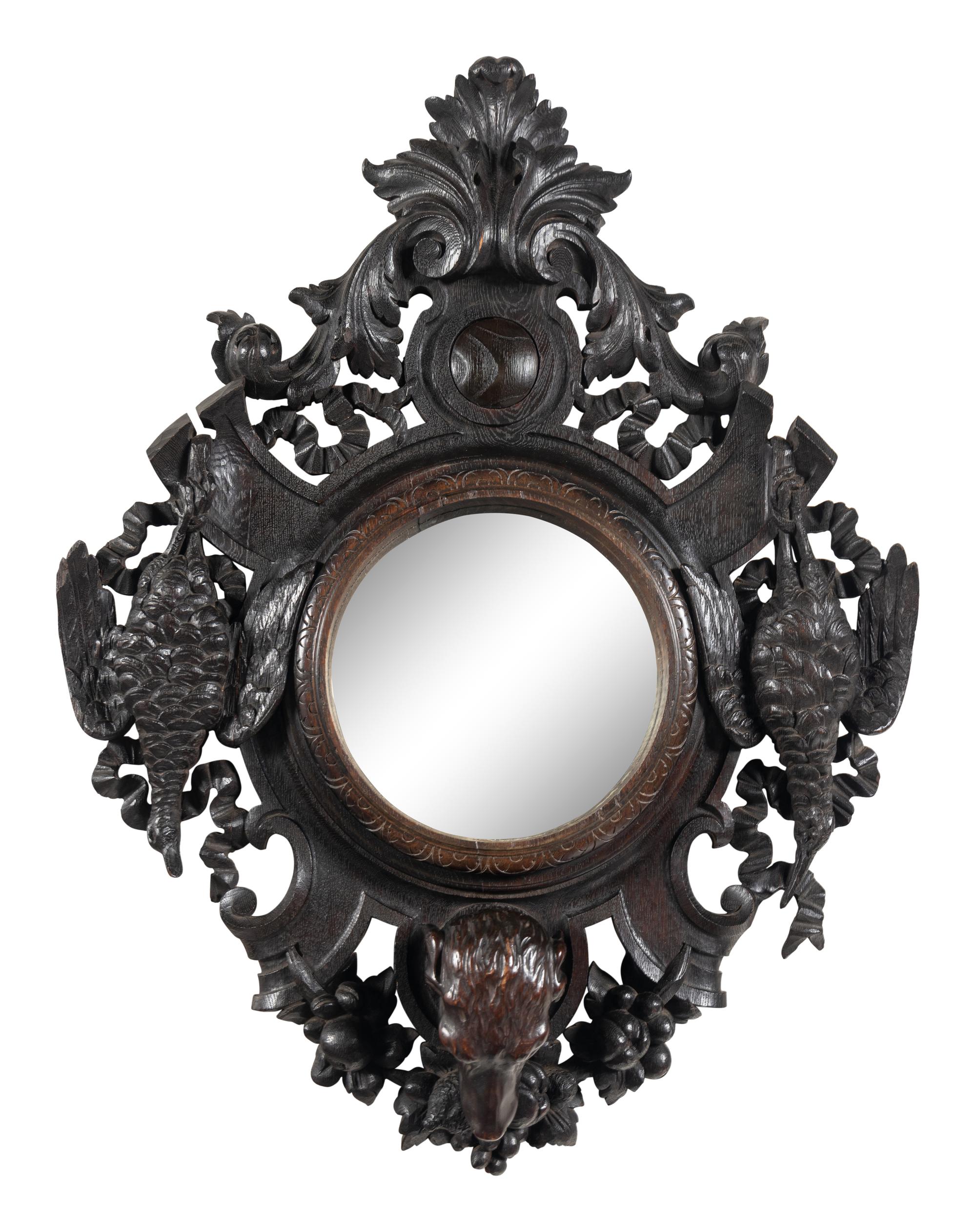 A Black Forest Carved Oak Game Trophy Mirror