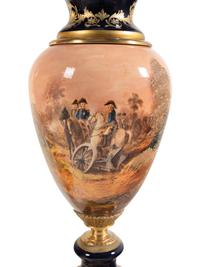 A Pair of Gilt Bronze Mounted Sèvres Style Porcelain Urns
