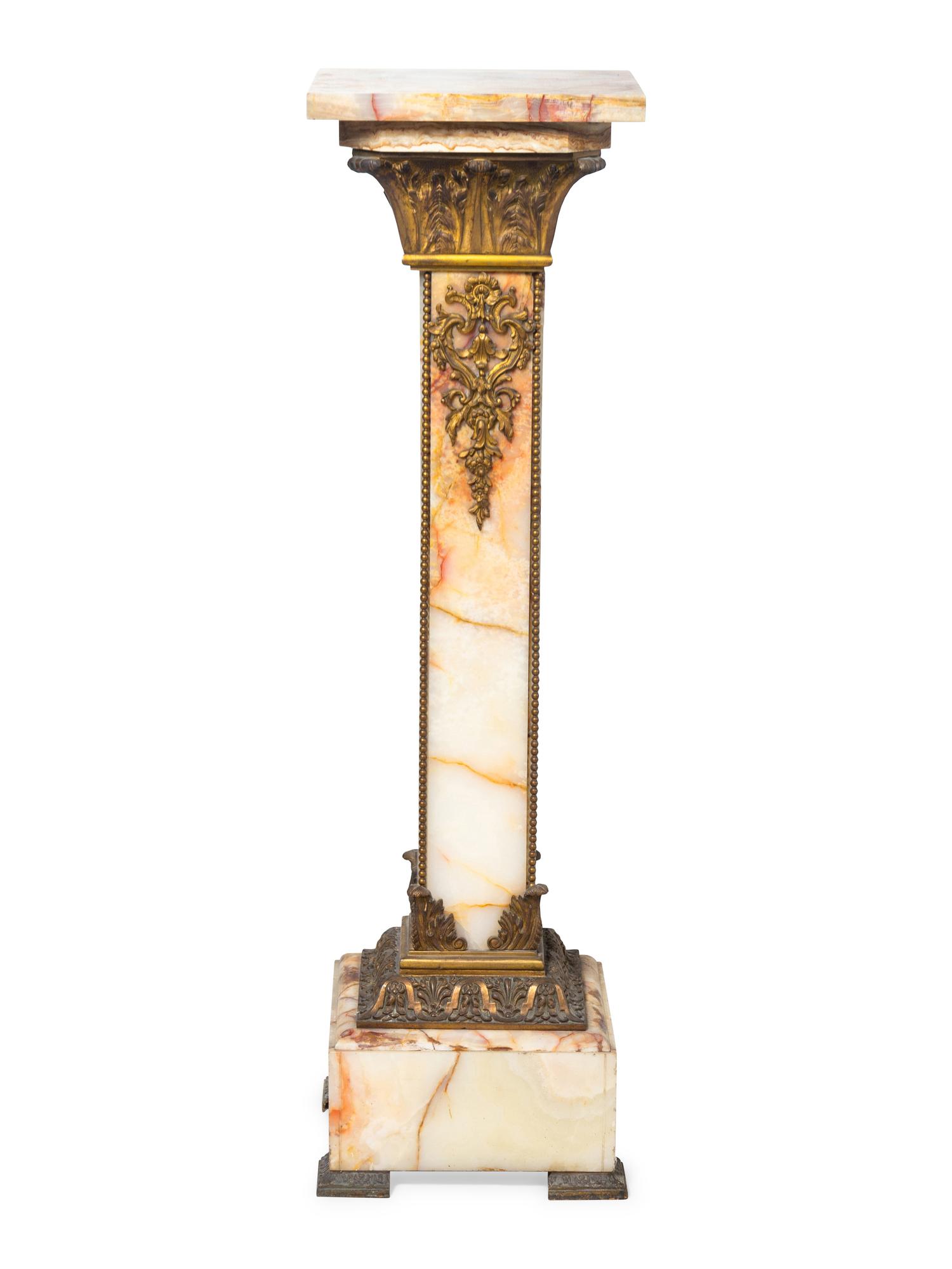 A Neoclassical Gilt Bronze Mounted Onyx Pedestal