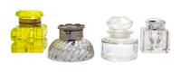 A Group of Four Glass Inkwells Height of tallest 3 inches.