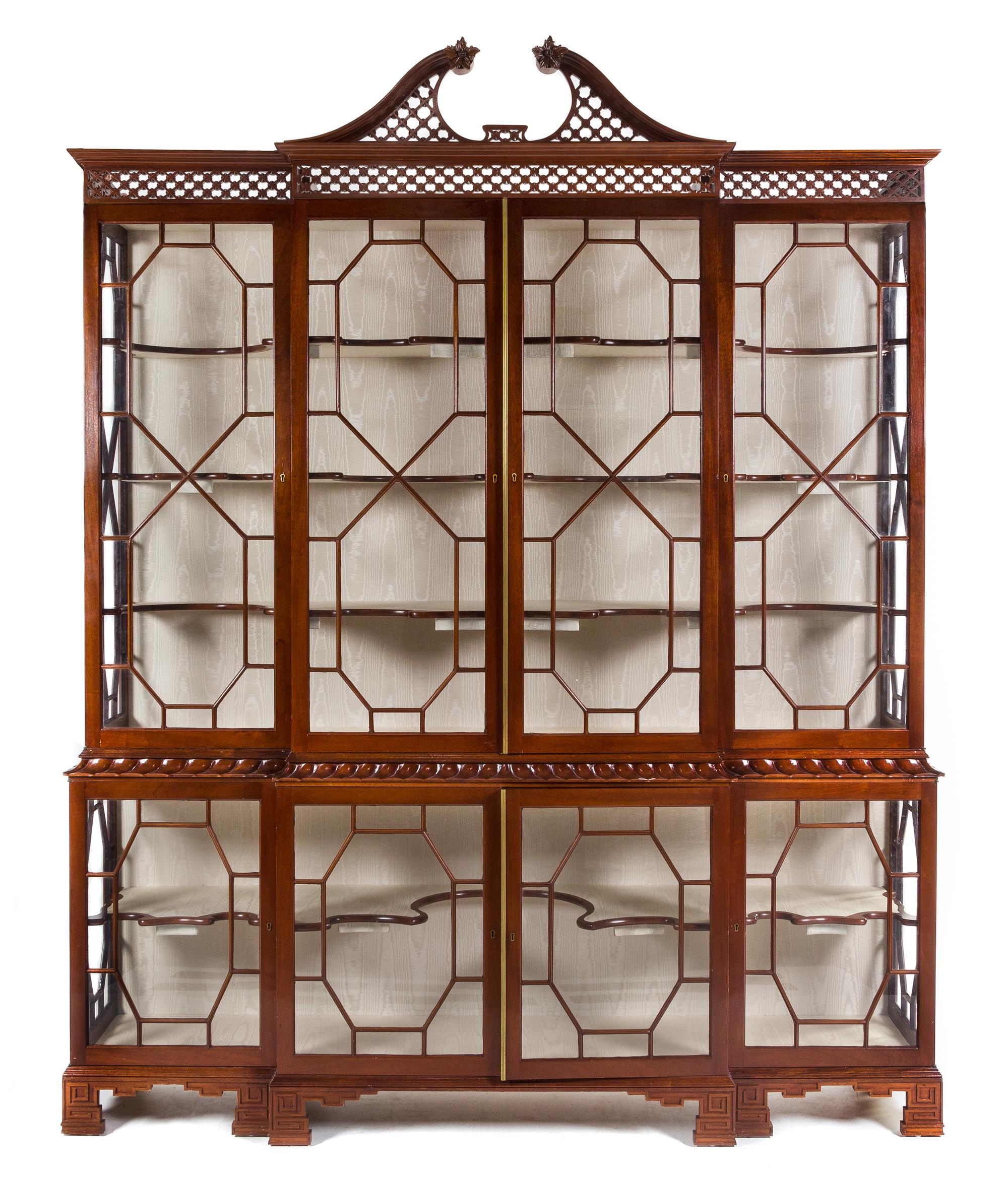A Chinese Chippendale Style Mahogany Breakfront Vitrine Cabinet Height 100 x width 81 1/2 x depth 17 1/4 inches. — 20TH CENTURY