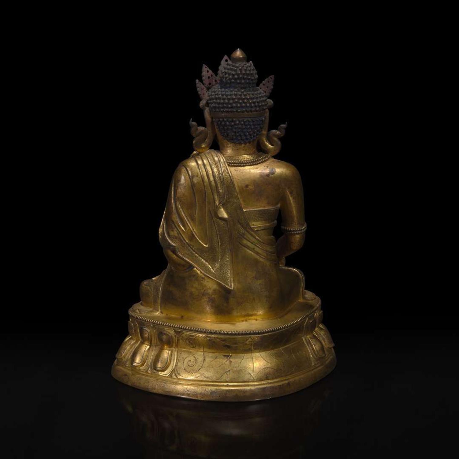 A Sino-Tibetan gilt bronze figure of Akshobhya 中原或藏传佛教阿閦佛铜造像 18th century ????