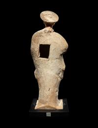 A Greek Painted Terra Cotta Male Figure