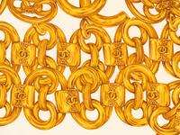 Five Chanel Items: Four Scarves and One Brooch, 1980-2000s