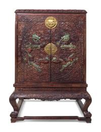 A Pair of Large Chinese Export Jade-Inset Carved Hardwood Chests on Stands