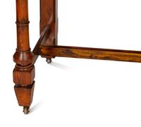 An English Arts and Crafts Style Stained Oak Writing Desk