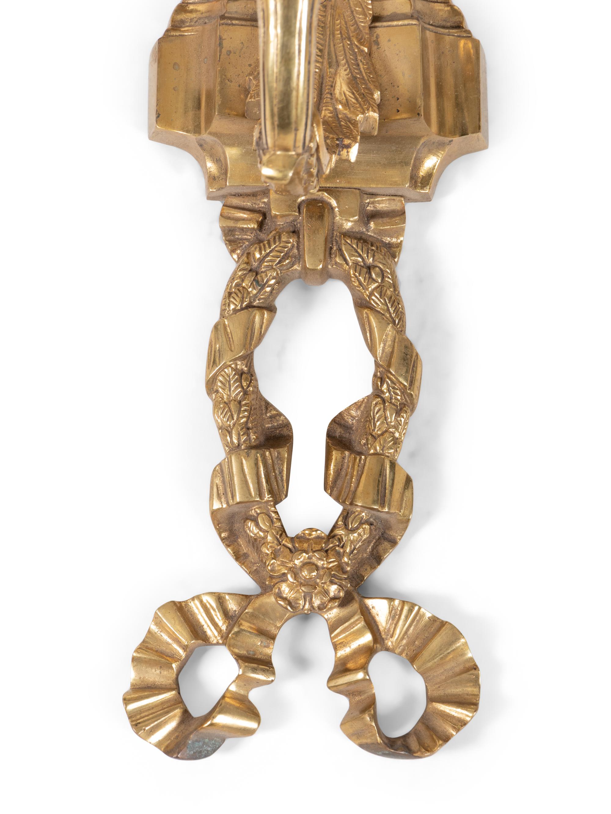 A Pair of Neoclassical Gilt Metal Five-Light Sconces with Frosted Glass Shades