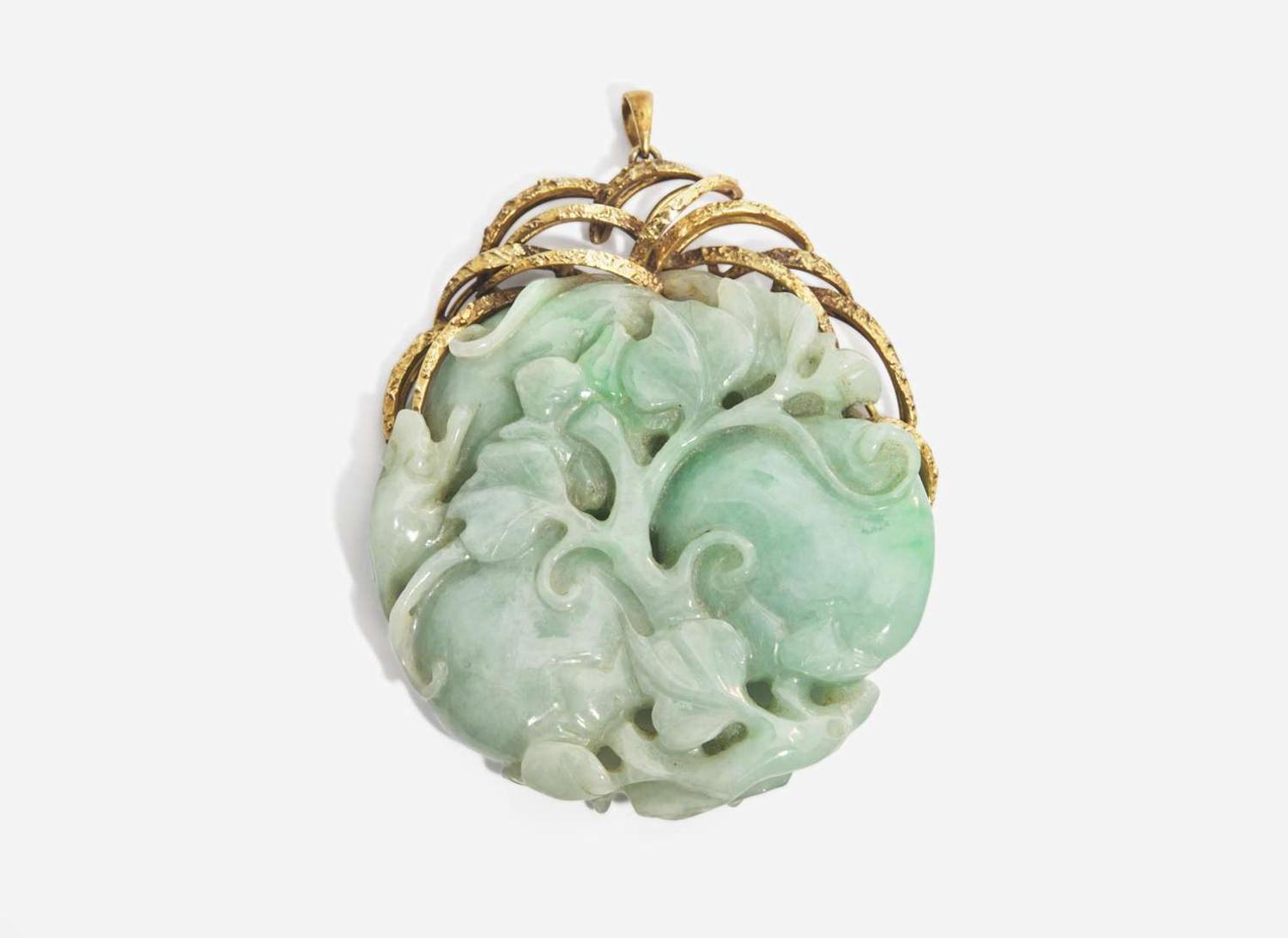A 14K Yellow Gold and Carved Jade Pendant