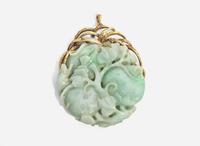 A 14K Yellow Gold and Carved Jade Pendant