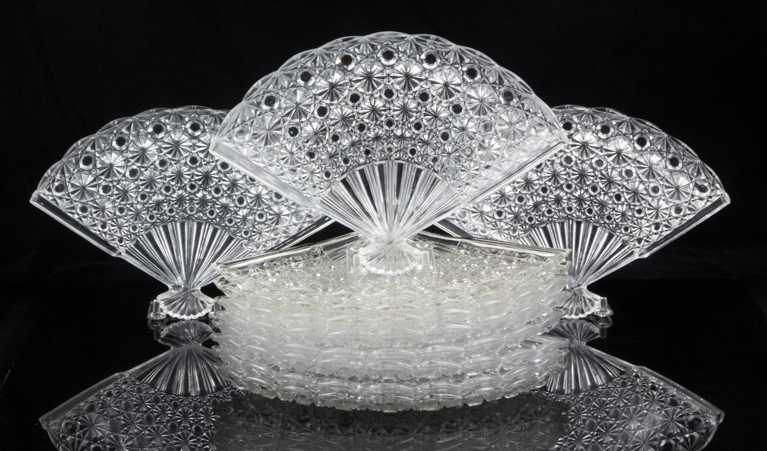 A Collection of Eleven Pressed Glass Dishes Width 10 1/2 inches.