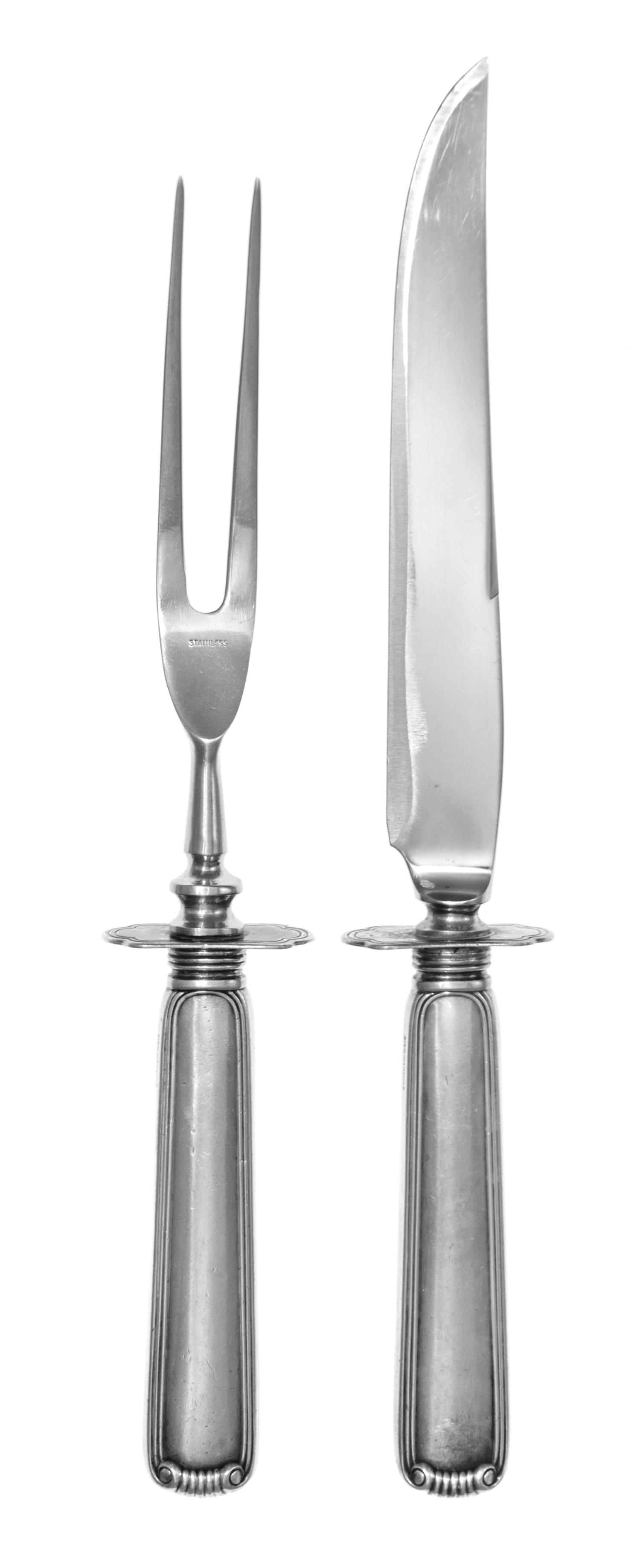 An American Sterling Silver Carving Set, , the fork and knife having scroll decoration to the handles.