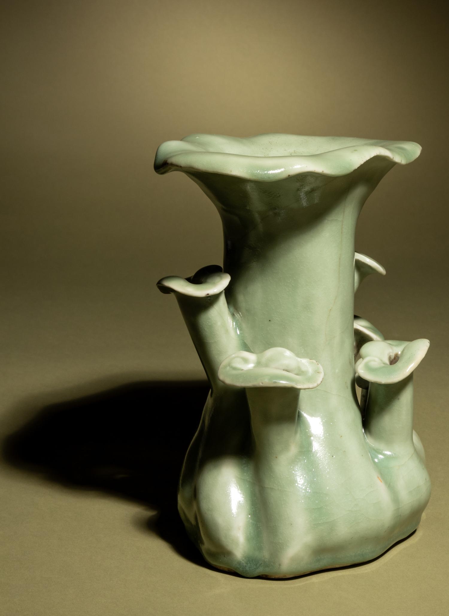 A Celadon Glazed Porcelain ‘Lingzhi’ Cache Pot