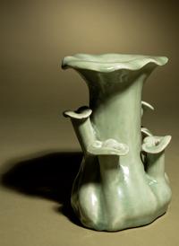A Celadon Glazed Porcelain ‘Lingzhi’ Cache Pot