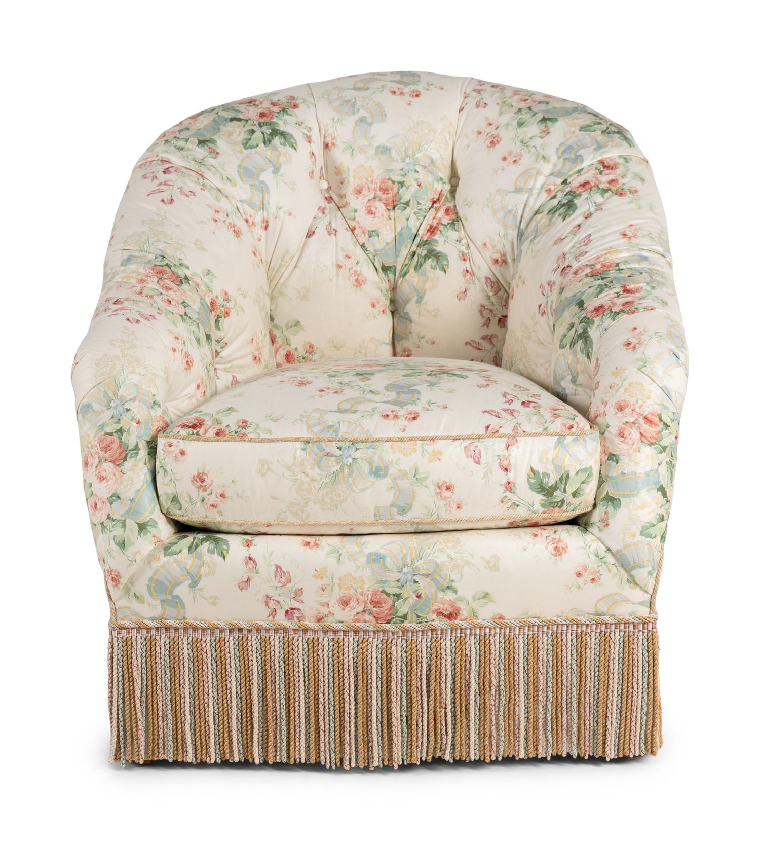 A Floral Chintz-Upholstered Lounge Chair and Ottoman