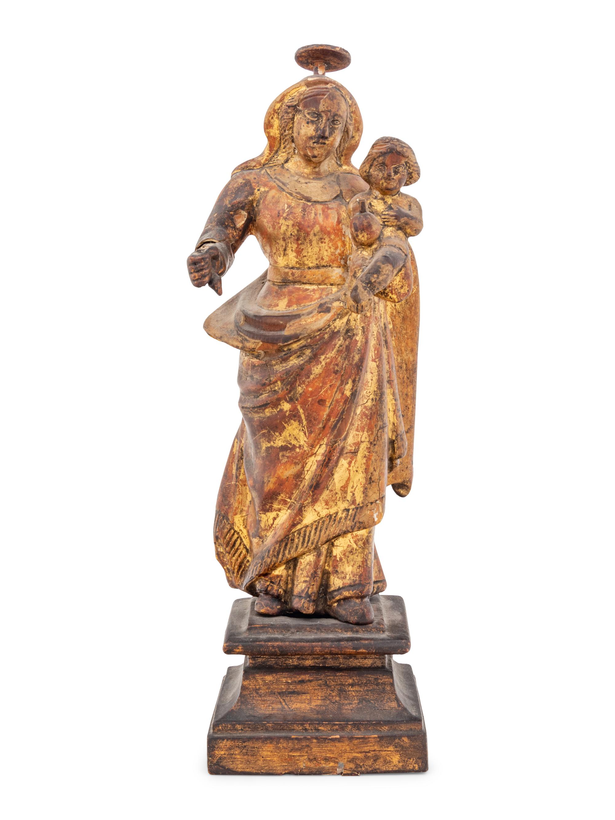 A Continental Carved and Gilt Decorated Santo Figure