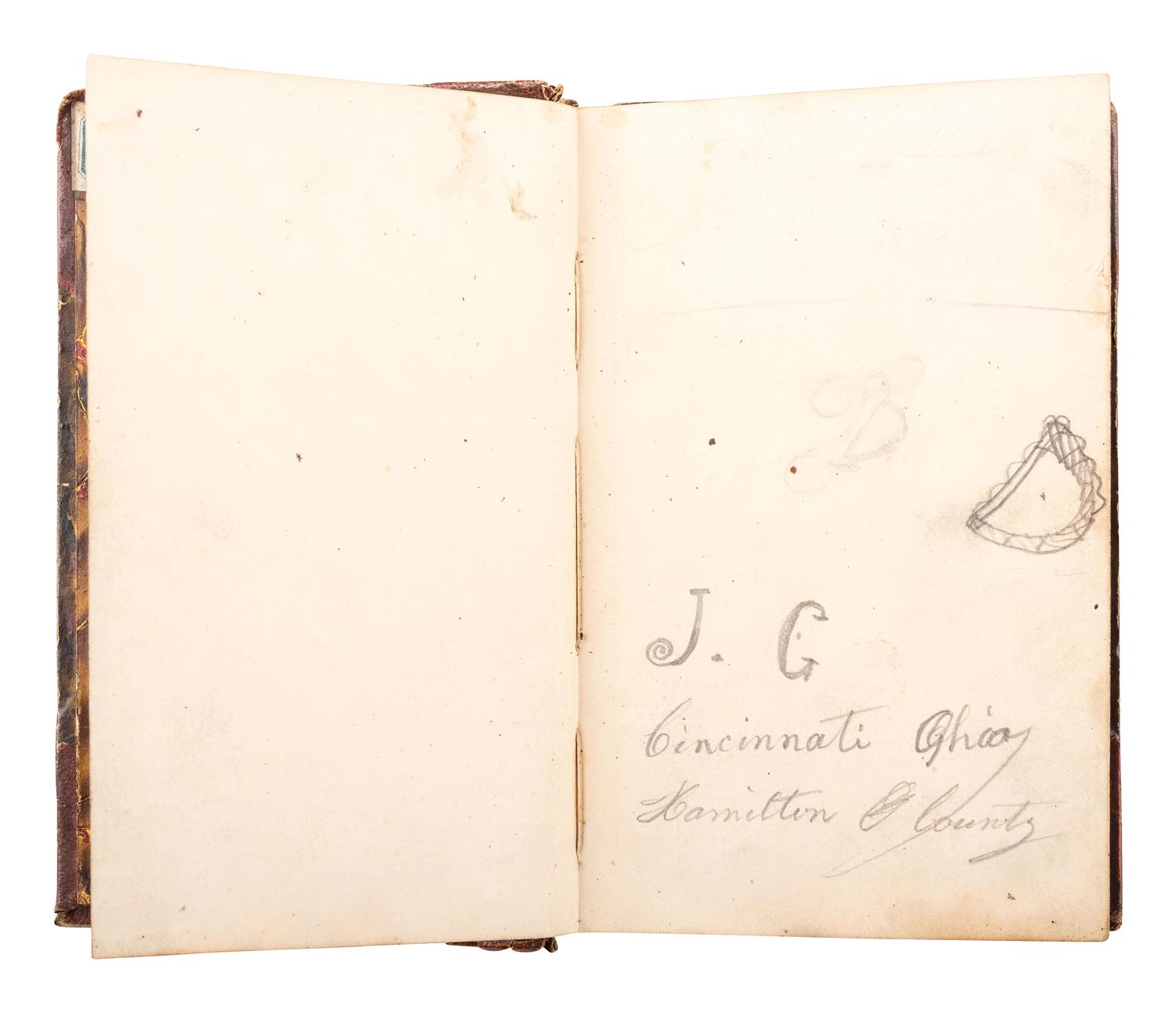 [CIVIL WAR]. A group of 4 items, highlighted by a quarter plate tintype of a Union infantryman posed with an American flag attributed as Joseph Graff, Company D, 23rd Kentucky Infantry.
