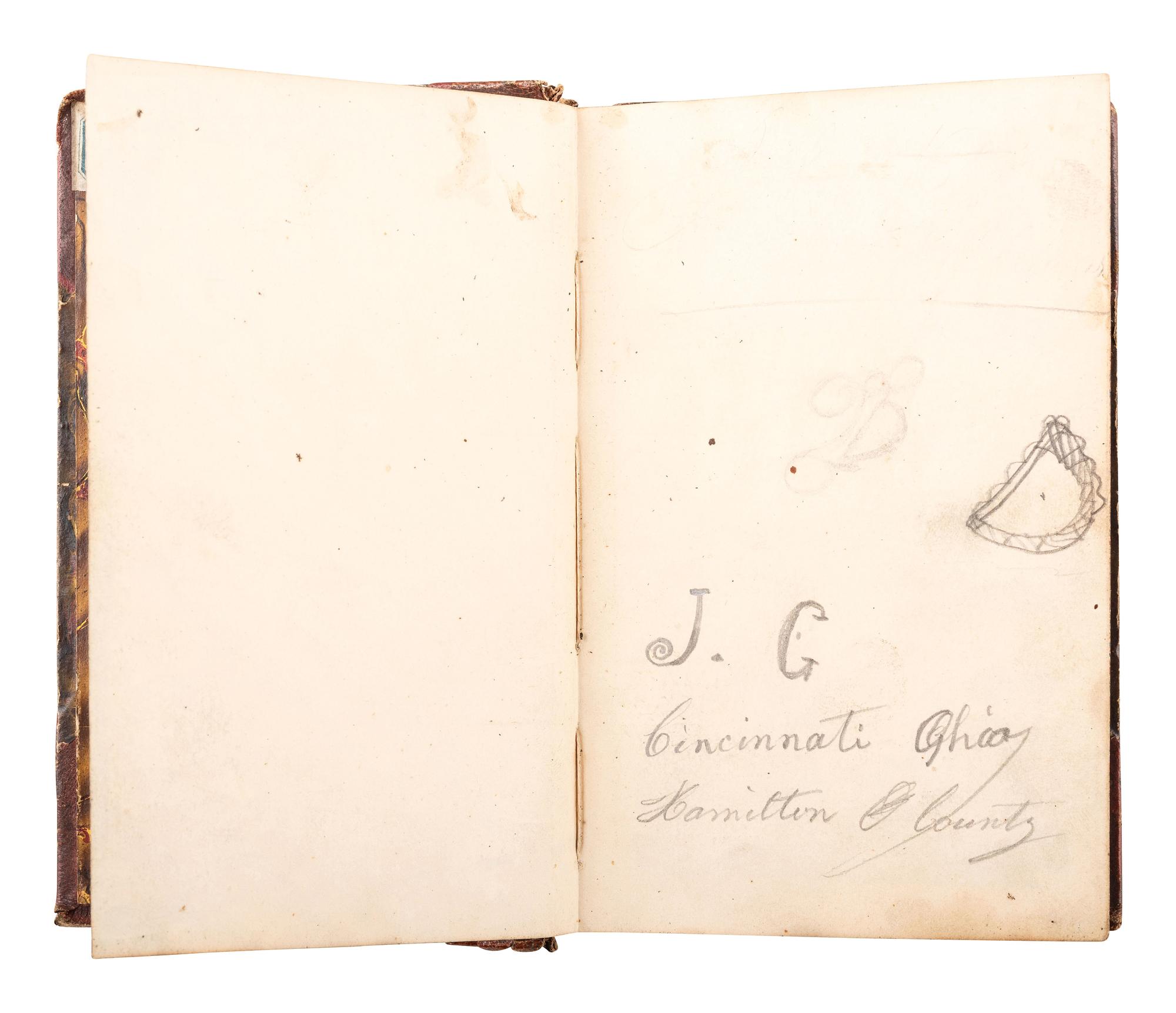 [CIVIL WAR]. A group of 4 items, highlighted by a quarter plate tintype of a Union infantryman posed with an American flag attributed as Joseph Graff, Company D, 23rd Kentucky Infantry.