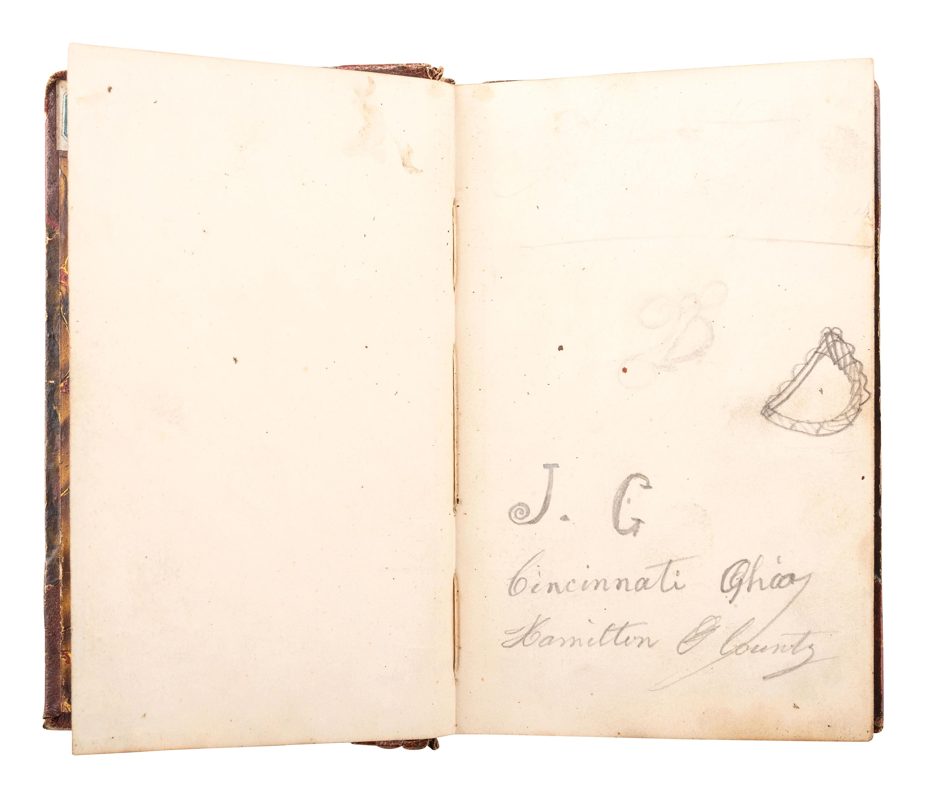 [CIVIL WAR]. A group of 4 items, highlighted by a quarter plate tintype of a Union infantryman posed with an American flag attributed as Joseph Graff, Company D, 23rd Kentucky Infantry.