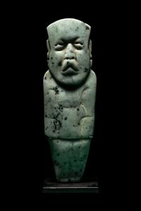 An Olmec Jade Figural Celt